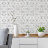 A simple design that celebrates the magic of geometry, this peel and stick wallpaper features a seamless, structured arrangement of intersecting circles. The circles are outlined in black on a white background. Their scale and minimal line weights give this wallpaper a polished sophistication that can easily blend with classic or Art Deco settings, while at the same time remaining perfectly compatible with informal contemporary spaces.