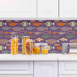 Turn your living space royal, playful and welcoming all at once with this charming peel and stick fish wallpaper. Its luxurious purple background showcases quirky fish illustrations composed of geometric elements and vibrant colors. A perfect partner for Boho-chic spaces, this rich PVC-free design is the dose of character that your rented home needs!