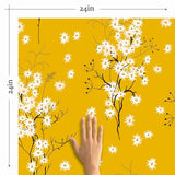 Transform any space into an autumnal paradise with this stunning floral wallpaper that combines gentle white blossoms with an intense mustard yellow background. The small-scale botanical illustrations in this design are simple and almost motif-like, balancing the dramatic yellow hue with a mild whimsical vibe. Try this PVC-free wallpaper to completely transform your bathrooms and utility spaces.