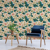 This distinctive peel and stick wallpaper takes a leaf out of nature’s book and turns it dramatic. Featuring bold, stylized drawings of deep green leaves and light pink blossoms on a beige background, this design follows all the rules of the botanical theme while simultaneously keeping things playful and quirky.