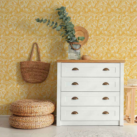 A fresh floral wallpaper that also comes with nice nostalgic notes, this white and yellow design is the perfect serving of warmth for your living space. Bask in the simple elegance of white botanical drawings on a muted yellow background. This seamless composition can be surreal in some places, delightfully vintage in others, and evoke a variety of moods depending on how you use it.