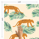 Energize your living space with a gorgeous peel and stick wallpaper featuring leopards and leaves as small-scale illustrations on a pale pink background. This warm and vibrant wallpaper brightens up its surroundings with its intense orange notes and balancing green highlights. Complement this richly finished PVC-free wallpaper with indoor greenery, natural finishes and neutral toned fixtures for a delightful, earthy feel.