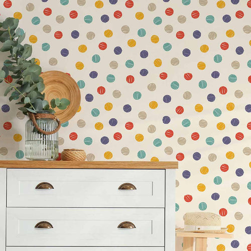 Fun, multicolor polka dots articulated in hurried strokes on an off-white background – this peel and stick wallpaper sports a simple, well-loved design you can’t go wrong with. This PVC-free wall covering could easily become your kids’ room staple, and can also be experimented with in other bedrooms and family spaces.
