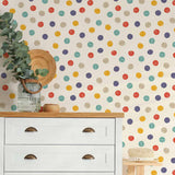 Fun, multicolor polka dots articulated in hurried strokes on an off-white background – this peel and stick wallpaper sports a simple, well-loved design you can’t go wrong with. This PVC-free wall covering could easily become your kids’ room staple, and can also be experimented with in other bedrooms and family spaces.