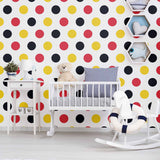 Sometimes, all you need to pep up your decor is a wall covered in happy polka dots. This peel and stick wallpaper places red, yellow and black polka dots on a white background. It is a seamless composition that can be used in spaces ranging from living rooms to children’s bedrooms. Its warm colors can be contrasted with blue and green elements to create a balanced vibe in any setting.