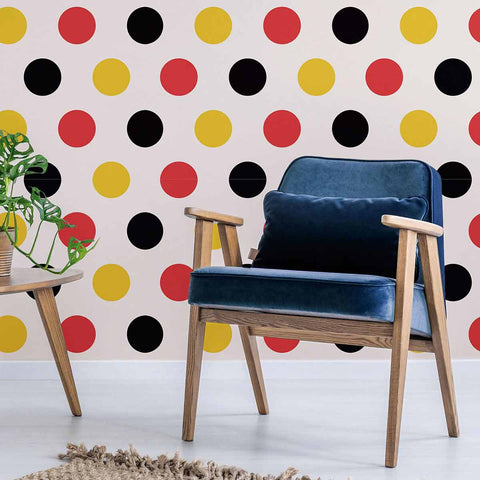 Sometimes, all you need to pep up your decor is a wall covered in happy polka dots. This peel and stick wallpaper places red, yellow and black polka dots on a white background. It is a seamless composition that can be used in spaces ranging from living rooms to children’s bedrooms. Its warm colors can be contrasted with blue and green elements to create a balanced vibe in any setting.