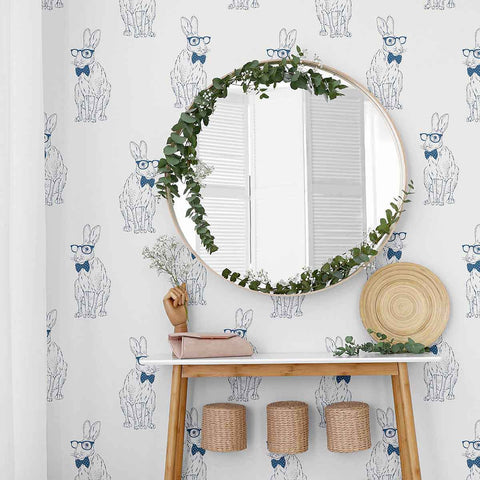 This wise rabbit in a bow tie and glasses has the answer to all your decor woes! Bring home this playful peel and stick wallpaper for a fun twist to your bedroom or home office interiors. Its bespectacled bunny sketches appear in blue on a white background, painting a cute picture without overwhelming your decor. Have a room that needs a quirky yet subtle fix? This PVC-free removable wallpaper will do just that.