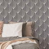 Hot air balloons in a geometric grid, anyone? This sophisticated yet playful peel and stick wallpaper combines whimsy with structure to create a lovely grey and white composition. Use it as a fun spin on the Art Deco aesthetic, or as an element of interest amid simple monochrome furniture and fixtures. Thanks to a PVC-free, latex coated design, this wallpaper has a rich finish to match its stylish composition.