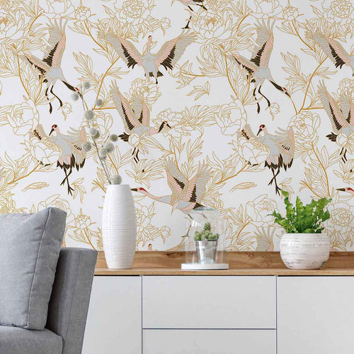 Lift your spirits with this breezy beige peel and stick wallpaper that features lovely Japanese cranes enveloped in floral illustrations. The graceful birds are portrayed in various stages of flight, while the line drawings of flowers and foliage give them a simple yet stylish background. This whimsical PVC-free wallpaper is perfect for practically any setting.