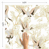 Lift your spirits with this breezy beige peel and stick wallpaper that features lovely Japanese cranes enveloped in floral illustrations. The graceful birds are portrayed in various stages of flight, while the line drawings of flowers and foliage give them a simple yet stylish background. This whimsical PVC-free wallpaper is perfect for practically any setting.
