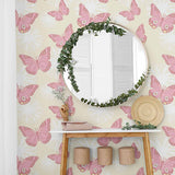 What’s not to love about pretty pink butterflies on a light yellow background? This PVC-free peel and stick wallpaper is relaxed yet fun, unique yet versatile, and both kids and adults will love it! The butterfly illustrations appearing in it are large and intricate, and gentle white sketches of flowers in the background make the composition even richer.