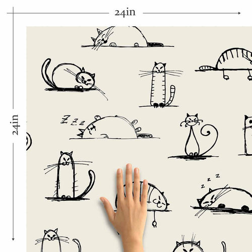 Do you know just how quickly a sleepy cat can liven up your decor? Find out by bringing home this cute cat themed peel and stick wallpaper featuring felines in various states of relaxation. The black cat drawings have a fun, informal graphic style and create a welcoming composition on a taupe background. We bet these kittens will inspire you to take it easy and look like a million bucks while you’re at it!