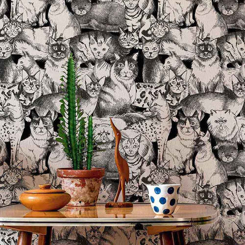 It’s fabulous, it’s functional, and it’s full to the brim with feline elegance! This distinctive peel and stick wallpaper gets creative with its cat theme, picturing countless gorgeous cat sketches arranged in an organic, seamless composition. Intricate and artistic, the closely packed grey illustrations give this stylish PVC-free wallpaper a layered, tactile presence.