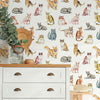 Cuteness, quirks, effortless elegance – it’s hard to pick a favorite reason to love your cat! This unique peel and stick wallpaper celebrates all kinds of feline fabulousness. From adorable munchkins to elegant Siamese cats, find them all in this beautiful print that carries oodles of whimsy and a touch of vintage charm.