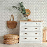 A simple design that celebrates the magic of geometry, this peel and stick wallpaper features a seamless, structured arrangement of intersecting circles. The circles are outlined in black on a white background. Their scale and minimal line weights give this wallpaper a polished sophistication that can easily blend with classic or Art Deco settings, while at the same time remaining perfectly compatible with informal contemporary spaces.