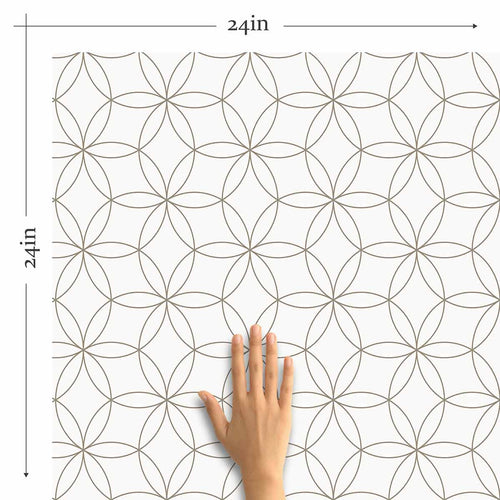 A simple design that celebrates the magic of geometry, this peel and stick wallpaper features a seamless, structured arrangement of intersecting circles. The circles are outlined in black on a white background. Their scale and minimal line weights give this wallpaper a polished sophistication that can easily blend with classic or Art Deco settings, while at the same time remaining perfectly compatible with informal contemporary spaces.