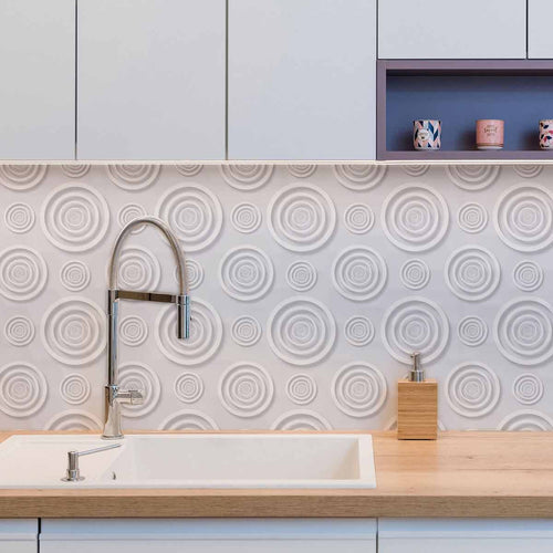 A serene grey wallpaper with a sculptural presence, this seamless pattern of concentric circles and cleverly printed shadows will give your decor a rich, tactile quality. This is just the wall treatment you need when you don’t want to interfere with an existing color palette or design style, but would like to add some depth and interest to the space.