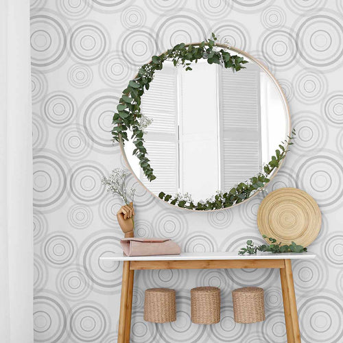 Wheel out a brand new look for your living space with this delightful geometric wallpaper. Covered in circles of assorted sizes and in assorted shades of grey, this cheerful design has a calming yet energizing feel to it. Perfect for personalizing your bedroom, turning a corner of your home office into a cozy recreation space, or giving a boring hallway a lively twist, this versatile PVC-free wallpaper is a great find.