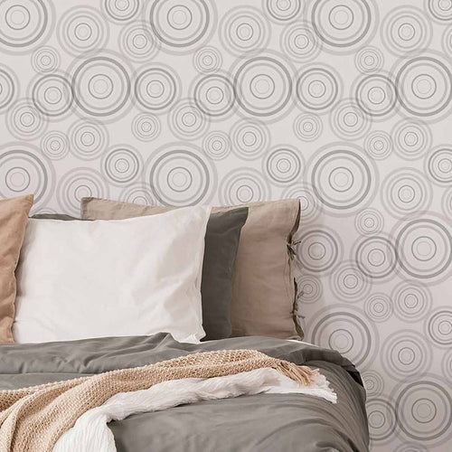 Wheel out a brand new look for your living space with this delightful geometric wallpaper. Covered in circles of assorted sizes and in assorted shades of grey, this cheerful design has a calming yet energizing feel to it. Perfect for personalizing your bedroom, turning a corner of your home office into a cozy recreation space, or giving a boring hallway a lively twist, this versatile PVC-free wallpaper is a great find.