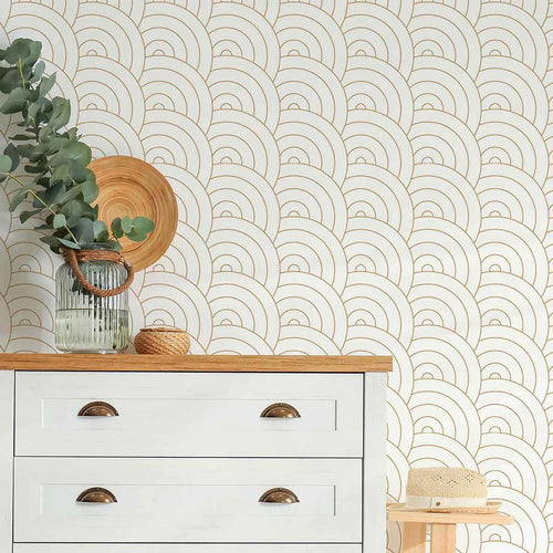 Presenting dreamy, fluffy clouds in a geometric avatar, this minimal yet cheerful geometric wallpaper arranges concentric curvilinear elements in a seamless grid. This black and white removable wallpaper brings both structure and softness to a setting, and is versatile enough for use in spaces ranging from entryways and bedrooms to kitchens and bathrooms.