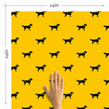 Did someone say animal magnetism? This fun, quirky peel and stick wallpaper is sunny sophistication and canine cuteness packed into one neat design! Featured on its intense yellow background are little black dog silhouettes arranged in diagonal lines. This bright and bold PVC-free wallpaper is perfect for any room that needs warming up.