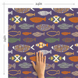 Turn your living space royal, playful and welcoming all at once with this charming peel and stick fish wallpaper. Its luxurious purple background showcases quirky fish illustrations composed of geometric elements and vibrant colors. A perfect partner for Boho-chic spaces, this rich PVC-free design is the dose of character that your rented home needs!
