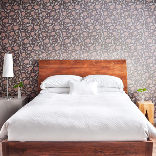 Need something worthy of a feature wall? This charismatic floral wallpaper was made to stand out in all the right ways! Stylizing botanical elements into a cool contemporary composition, it adds character to any wall space and blends in with any monochrome setting. While this removable wallpaper can be moved around the house as much as you like, its bold look is best suited to prominent locations like entranceways and living rooms.