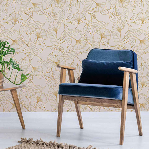 This beige peel and stick wallpaper keeps things simple, serene and sophisticated with its lovely line drawings of flowers and foliage. Creating a seamless composition all throughout, it fills your living space with a quiet but undeniable charm. The warm color tones in this chic design give it a golden look, while a latex coating adds a rich matte finish to the PVC-free product.