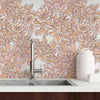 When classic floral wallpaper decides to have some fun, it takes the form of this charming design! Toeing the line between floral and abstract, this fun, breezy composition portrays closely packed peonies and leaves, drawn and colored in warm beige tones on a white background. Offering a summery feel in a nostalgic, vintage package, this PVC-free wallpaper will turn any dull space unique within minutes.