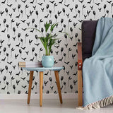 This carefree floral wallpaper will win you over with its simple and irresistible charm! Featuring black floral illustrations on a white background, it keeps things straightforward and versatile. The magic happens within the illustrations themselves. Flowers and leaves are represented as winged elements taking flight and giving the entire seamless composition a whimsical, cheerful appearance.