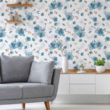 Take your decor on a blissful sojourn with this floral blue wallpaper that is just the right blend of relaxed and dynamic. Hibiscus blossoms are pictured all over the wall covering in gentle blue tones with a watercolor style, while little orange highlights energize the seamless and organic composition.&nbsp;Bring home a ton-toxic, PVC-free wall treatment that is both functionally and aesthetically a safe choice!