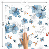 Take your decor on a blissful sojourn with this floral blue wallpaper that is just the right blend of relaxed and dynamic. Hibiscus blossoms are pictured all over the wall covering in gentle blue tones with a watercolor style, while little orange highlights energize the seamless and organic composition.&nbsp;Bring home a ton-toxic, PVC-free wall treatment that is both functionally and aesthetically a safe choice!