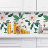 For your next home makeover, treat your walls to this luxuriously vintage floral wallpaper featuring pale pink blossoms and deep green leaves on a white background. The large scale of the botanical elements gives the composition a flamboyant feel that makes it perfect as an eye-catching highlight such as a feature wall or a distinctive kitchen backsplash.