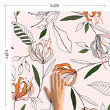 Vintage in its look-feel, yet capable of complementing contemporary spaces, this artistic floral peel and stick wallpaper is a handy addition to your decor kitty. Beautiful blooms and leaves appear all over its pale pink background, and occasional touches of orange and green bring them to life. Carrying a classic feel, this PVC-free wallpaper also knows how to be playfully modern.