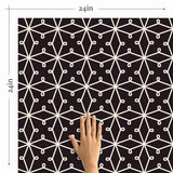 Abstracting a&nbsp;lacy pattern&nbsp;into a network of straight lines, this geometric peel and stick wallpaper finds the sweet spot between organic and structured. Its deep purple background gives it a rooted, regal vibe, on which the white illustrations appear as a stylish contrast. This PVC-free wall covering has a versatile, scalable look that can stylize both expansive rooms and compact surfaces.