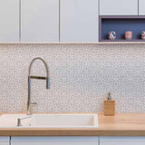 Embrace refined elegance with this geometric grey peel and stick wallpaper that also exudes a lovely botanical vibe. Curvilinear motifs with a floral inspiration come together to create a beautiful white lattice on a grey background, and result in a wall treatment that will align with any kind of setting. This PVC-free, eco-friendly wallpaper is a safe bet both aesthetically and in terms of maintaining a healthy indoor environment.