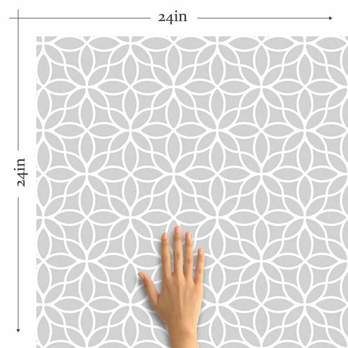 Embrace refined elegance with this geometric grey peel and stick wallpaper that also exudes a lovely botanical vibe. Curvilinear motifs with a floral inspiration come together to create a beautiful white lattice on a grey background, and result in a wall treatment that will align with any kind of setting. This PVC-free, eco-friendly wallpaper is a safe bet both aesthetically and in terms of maintaining a healthy indoor environment.