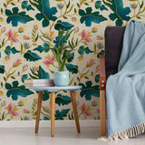This distinctive peel and stick wallpaper takes a leaf out of nature’s book and turns it dramatic. Featuring bold, stylized drawings of deep green leaves and light pink blossoms on a beige background, this design follows all the rules of the botanical theme while simultaneously keeping things playful and quirky.