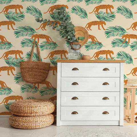Energize your living space with a gorgeous peel and stick wallpaper featuring leopards and leaves as small-scale illustrations on a pale pink background. This warm and vibrant wallpaper brightens up its surroundings with its intense orange notes and balancing green highlights. Complement this richly finished PVC-free wallpaper with indoor greenery, natural finishes and neutral toned fixtures for a delightful, earthy feel.