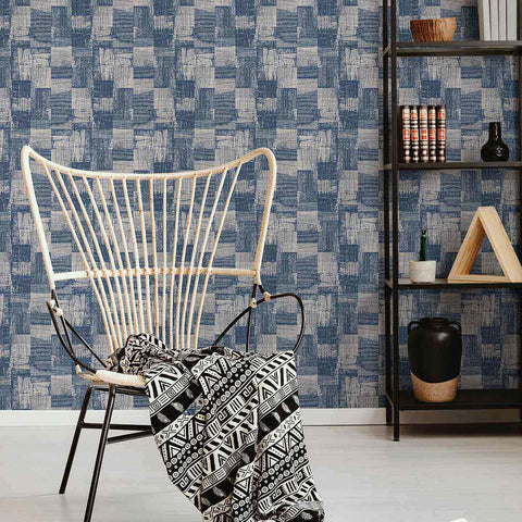 A gorgeous print with a side helping of grunge, this textured peel and stick wallpaper is a head turner. Using a sophisticated blue-grey shades, a high quality print, and a rich matte finish, it perfectly emulates a woven linen rug with a raw, rustic feel to it. When putting together a laid back Boho chic space, this distinctive, PVC-free wallpaper serves as the perfect backdrop.