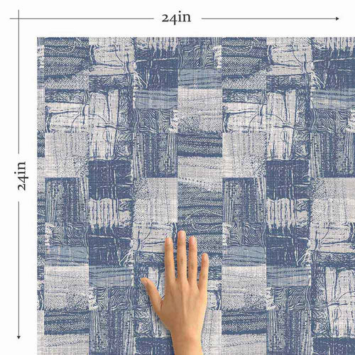 A gorgeous print with a side helping of grunge, this textured peel and stick wallpaper is a head turner. Using a sophisticated blue-grey shades, a high quality print, and a rich matte finish, it perfectly emulates a woven linen rug with a raw, rustic feel to it. When putting together a laid back Boho chic space, this distinctive, PVC-free wallpaper serves as the perfect backdrop.
