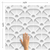 Enrich your living space with texture and geometry with the help of this unique peel and stick wallpaper that carries a 3 dimensional look. Square meshes appear to overlap and change directions to give this design an abstract, mechanical vibe. Use this grey and white PVC-free wallpaper to bring a futuristic ambiance to a contemporary living space.