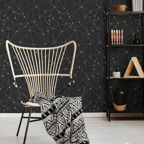 When there are too many considerations to keep in mind for your next decor upgrade, let this unique geometric wallpaper connect the dots for you! Featuring a seamless network of slender white and grey lines converging on dots over a dark grey background, this sophisticated peel and stick wall covering brings a slick, futuristic vibe to your living space.