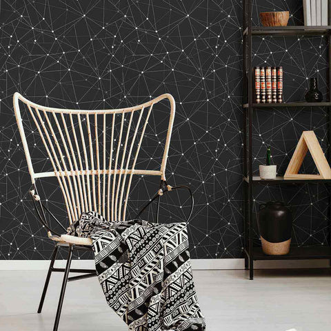 When there are too many considerations to keep in mind for your next decor upgrade, let this unique geometric wallpaper connect the dots for you! Featuring a seamless network of slender white and grey lines converging on dots over a dark grey background, this sophisticated peel and stick wall covering brings a slick, futuristic vibe to your living space.