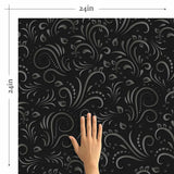 There’s no quicker way to sophistication than through this stunning black floral wallpaper that pairs the delicate grace of botanical motifs with the dramatic impact of a black color palette. The beautiful curvilinear motifs covering this design appear in varying grey tones to create a luxe, tactile look. A PVC-free build and finish completes the rich presence of this removable wallpaper.