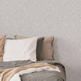 Subtle and stylish in equal measure, this serene grey floral wallpaper features an intricate composite of delicate botanical motifs. The small-scale, closely packed motifs, together with cleverly printed shadows and highlights, give this peel and stick wallpaper a 3-dimensional appearance. The textured look is further enhanced by the rich matte finish of the latex coating that protects this PVC-free wallpaper.
