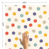 Fun, multicolor polka dots articulated in hurried strokes on an off-white background – this peel and stick wallpaper sports a simple, well-loved design you can’t go wrong with. This PVC-free wall covering could easily become your kids’ room staple, and can also be experimented with in other bedrooms and family spaces.