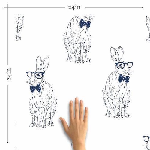 This wise rabbit in a bow tie and glasses has the answer to all your decor woes! Bring home this playful peel and stick wallpaper for a fun twist to your bedroom or home office interiors. Its bespectacled bunny sketches appear in blue on a white background, painting a cute picture without overwhelming your decor. Have a room that needs a quirky yet subtle fix? This PVC-free removable wallpaper will do just that.