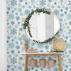 Give winter a warm welcome with this snowflake themed peel and stick wallpaper. Featuring a plethora of gorgeous snowflakes in multiple sizes and shades of blue and beige, this attractive design has a richly layered look. The intricate motifs and their cleverly printed shadows give the entire design a 3D feel. The combination of blue and white works particularly well when contrasted with warm woodsy treatments and natural finishes.