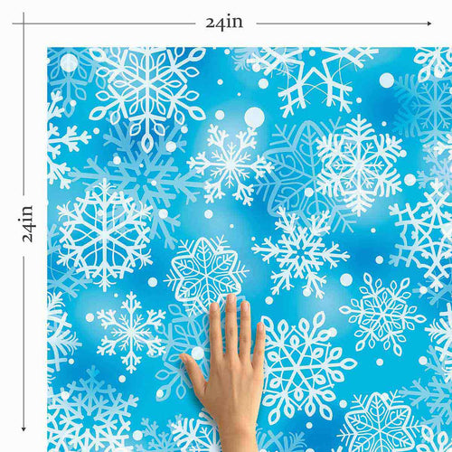 Let your decor hark of snow covered landscapes and relaxing holiday vibes with this beautiful blue peel and stick wallpaper. Featuring snowflake motifs on a sky blue background, it makes use of gentle color variations to produce a rich, layered effect that is perfectly complemented by a matte finish.